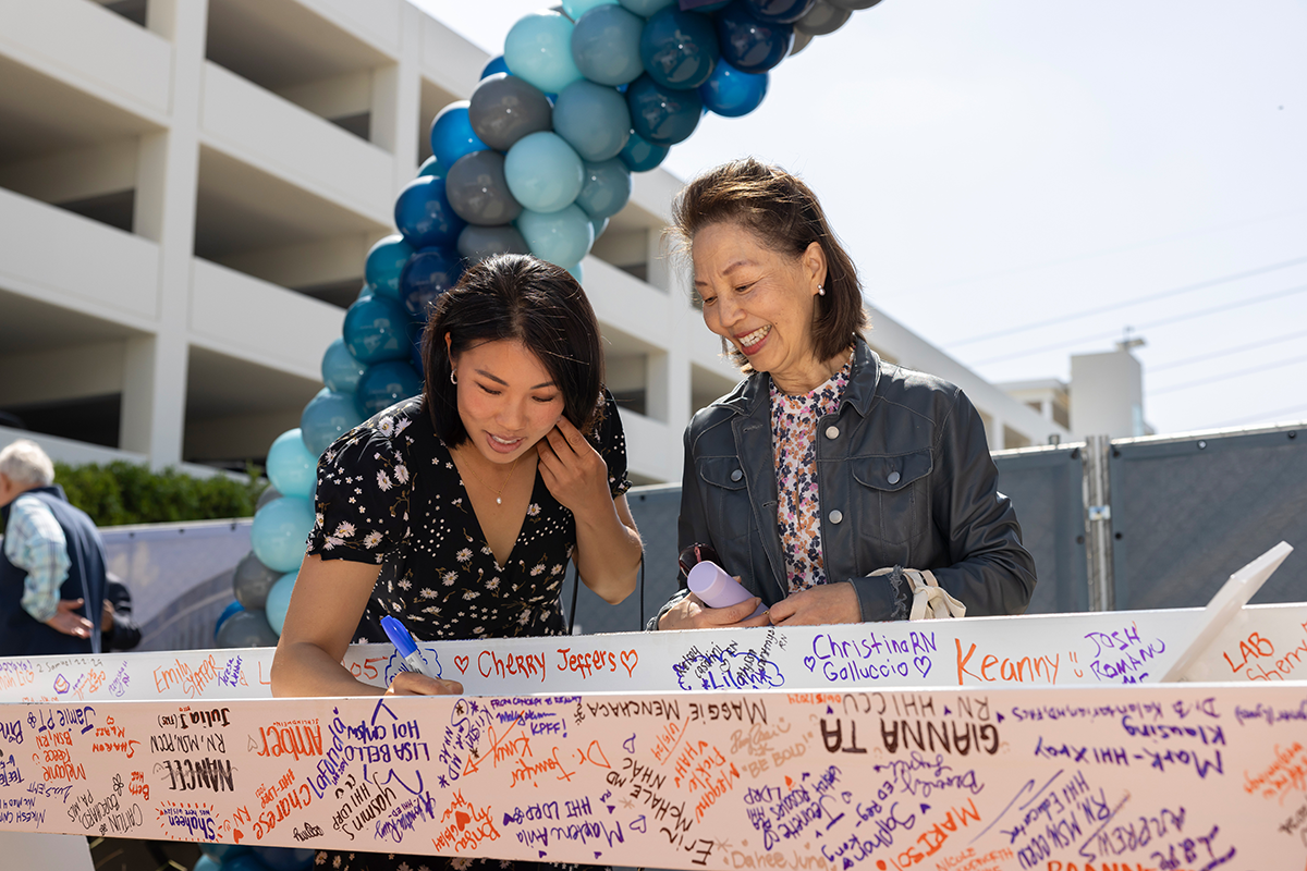 2024_Hoag_Hospital_Foundation_Sun_Family_Campus_Irvine_Beam_Signing_Diana_Dara_Sun
