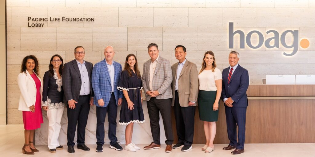 Leaders from Pacific Life and Hoag at the unveiling of the Pacific Life Foundation Lobby sign.